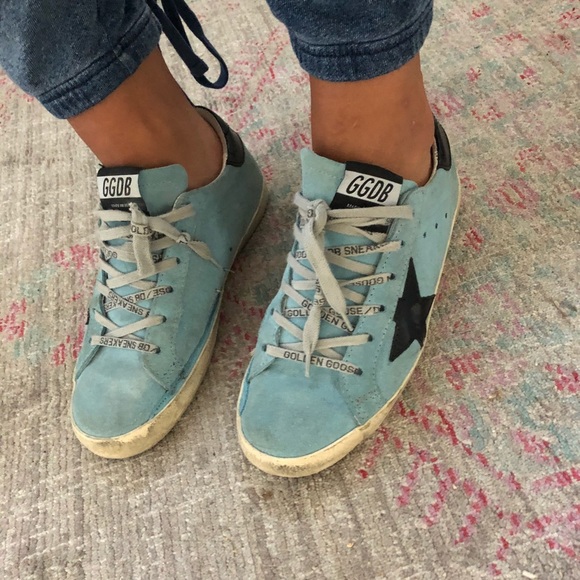 golden goose with blue star